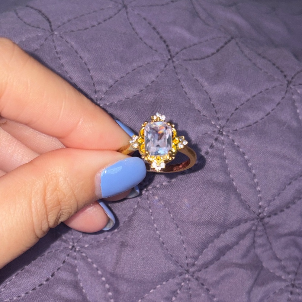 Elegant Gold and Pink Gemstone Ring